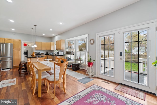 dining room featuring light hardwood / wood-style floors