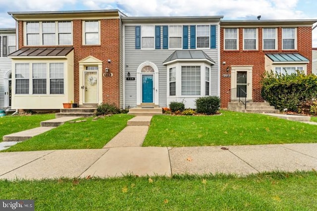 view of property featuring a front yard