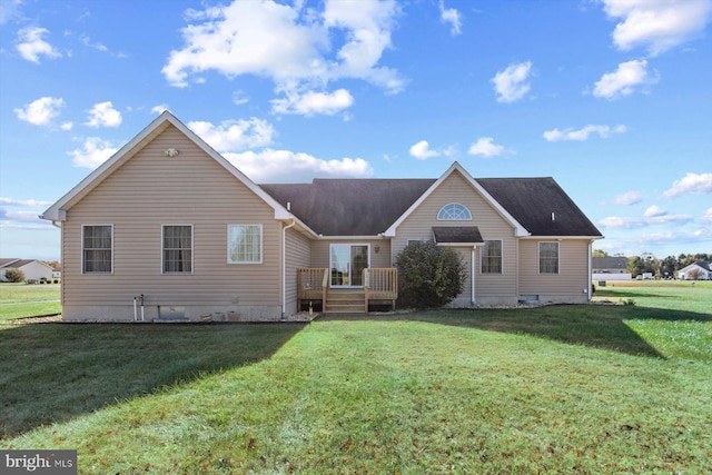 back of house with a yard