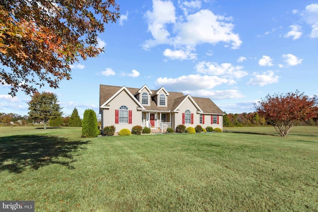 view of front of home featuring a front lawn and a porch