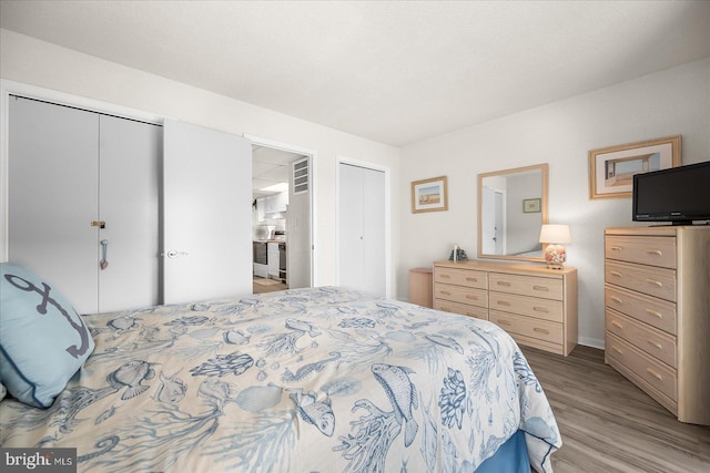 bedroom featuring light hardwood / wood-style floors