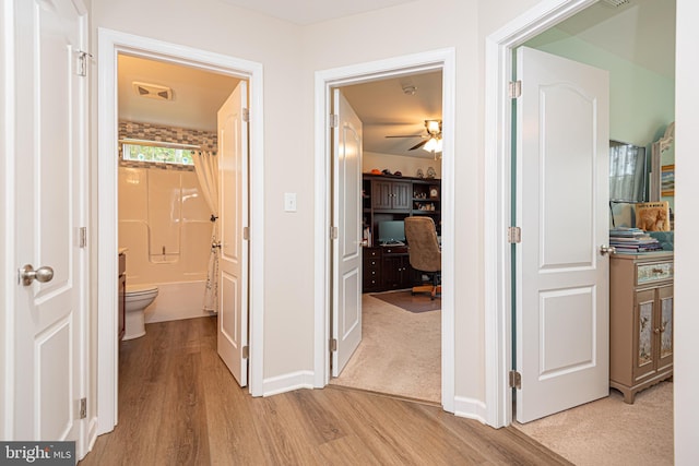 hall featuring light wood-type flooring