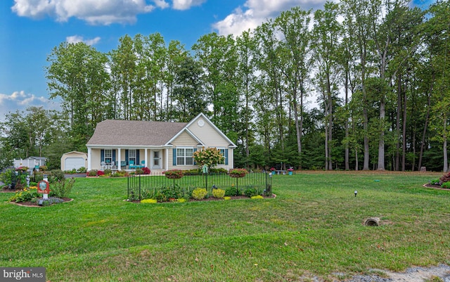 view of front of property featuring a front lawn and a garage