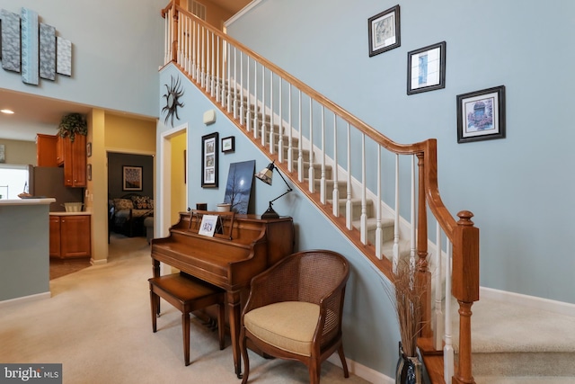 misc room with light colored carpet