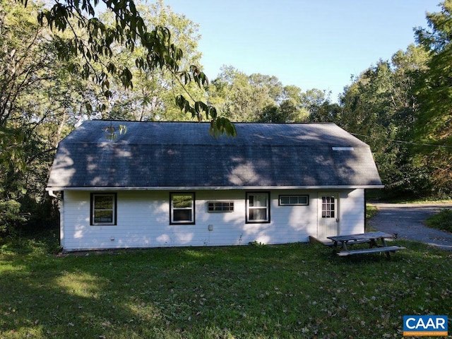 view of property exterior featuring a yard