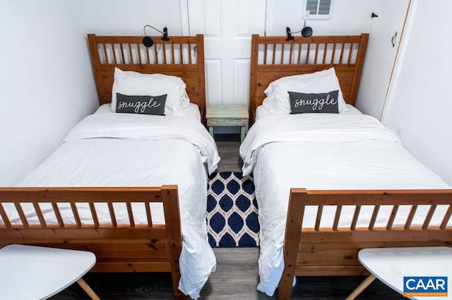 bedroom featuring dark hardwood / wood-style floors