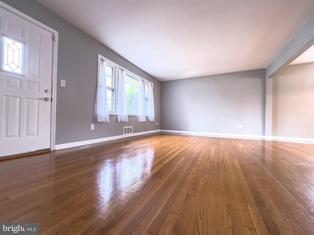 foyer featuring dark hardwood / wood-style floors