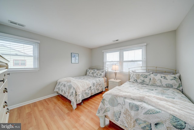 bedroom featuring light hardwood / wood-style floors