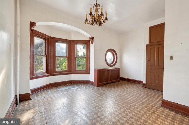 foyer featuring a notable chandelier