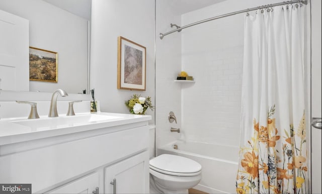 full bathroom with vanity, toilet, and shower / bathtub combination with curtain