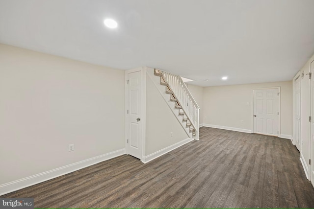 basement with dark wood-type flooring