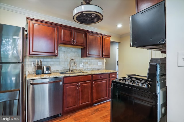 kitchen with sink, fridge, stainless steel dishwasher, black range with gas cooktop, and dark hardwood / wood-style floors