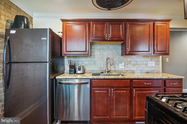 kitchen featuring sink, black appliances, light stone counters, and crown molding