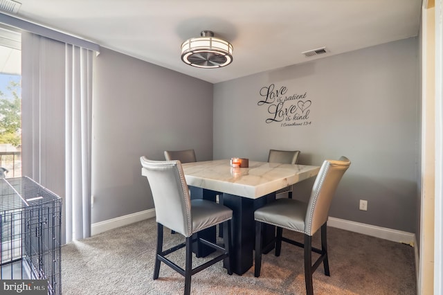 dining room with carpet flooring