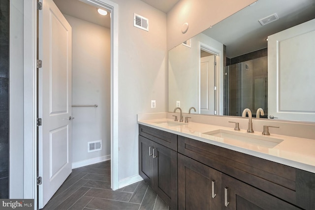 bathroom with vanity and walk in shower