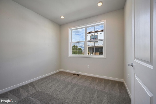 empty room with carpet flooring