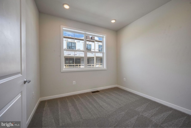 view of carpeted spare room