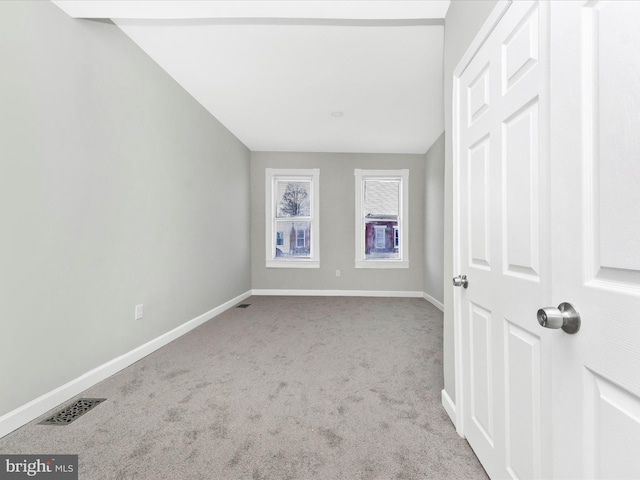 view of carpeted spare room