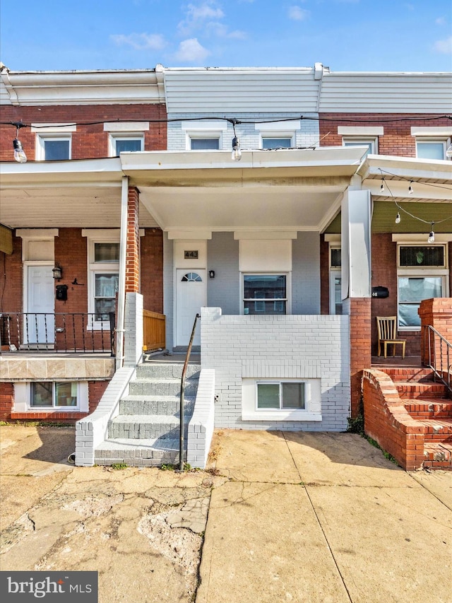 view of property with covered porch