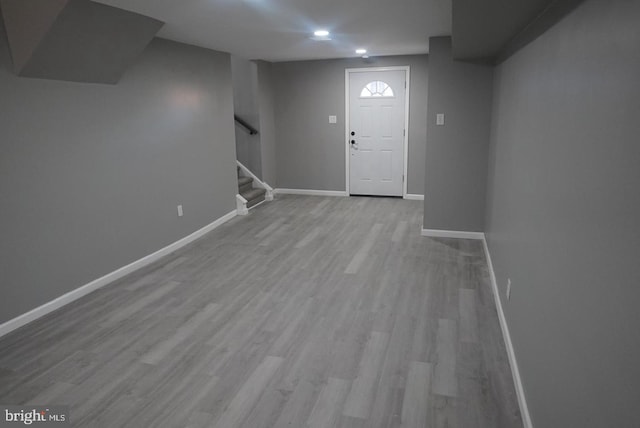 entryway with light hardwood / wood-style floors