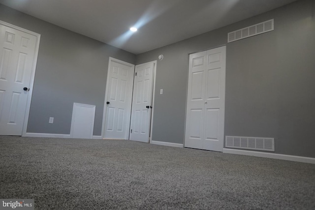 unfurnished bedroom featuring carpet floors