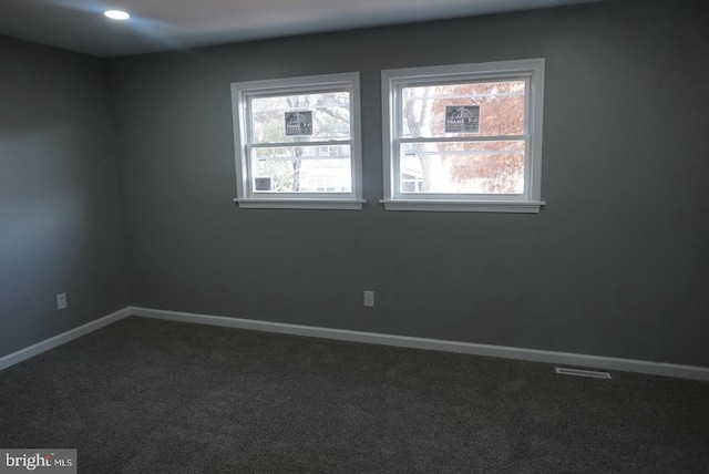 view of carpeted spare room