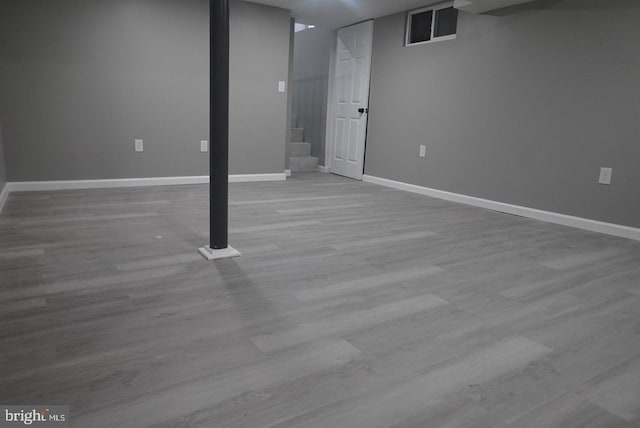 basement with light wood-type flooring