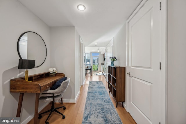 hall featuring light wood-type flooring