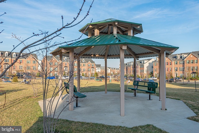 surrounding community featuring a yard