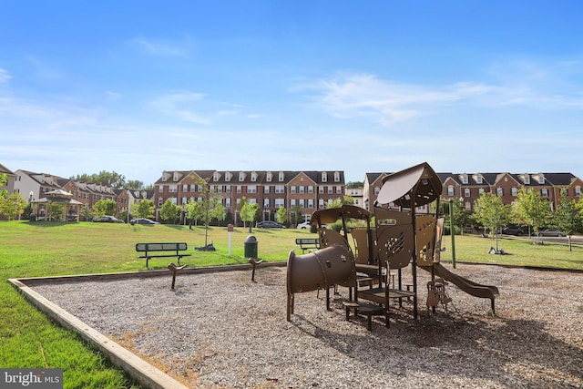 view of playground featuring a lawn