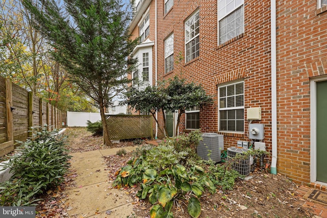 view of yard with central AC unit