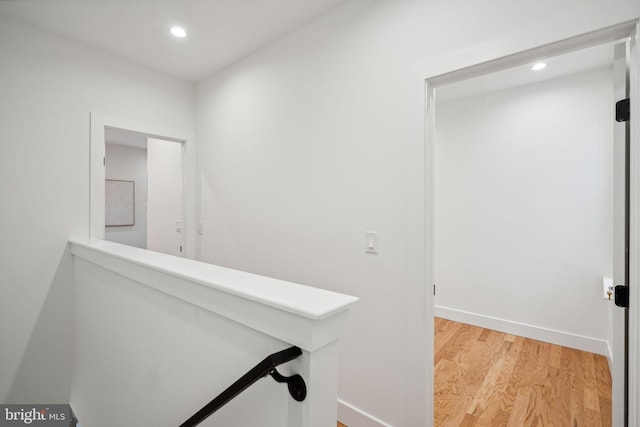 hallway with light wood-type flooring