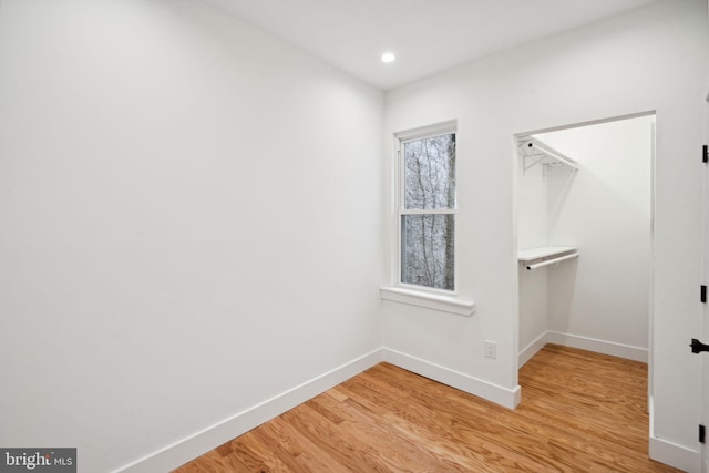 spacious closet featuring light wood-type flooring