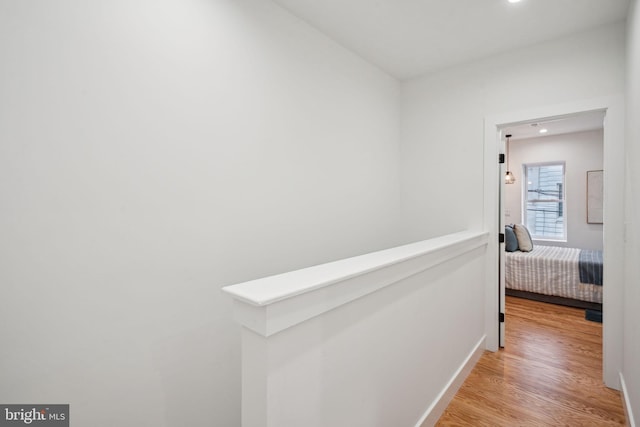 hall with light wood-type flooring