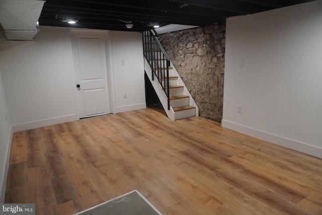 basement with light wood-type flooring