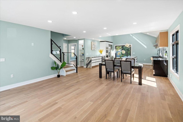 261 Moore St, Princeton, NJ 08540 - dining area with light wood-style flooring, baseboards, and a healthy amount of sunlight