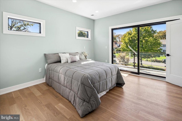 261 Moore St, Princeton, NJ 08540 - bedroom with multiple windows, access to outside, wood finished floors, and recessed lighting