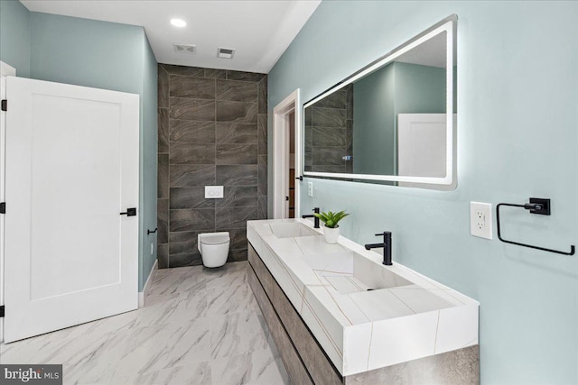 261 Moore St, Princeton, NJ 08540 - bathroom featuring toilet, marble finish floor, recessed lighting, and visible vents