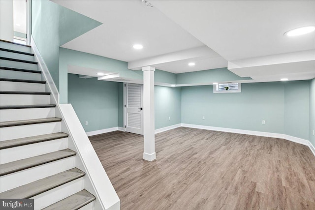 261 Moore St, Princeton, NJ 08540 - finished below grade area with stairs, baseboards, recessed lighting, and wood finished floors
