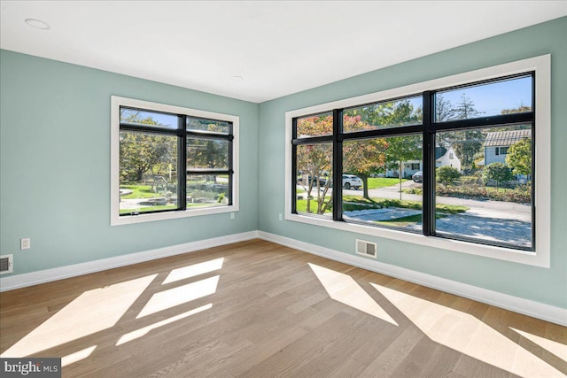 261 Moore St, Princeton, NJ 08540 - unfurnished room featuring baseboards, recessed lighting, visible vents, and wood finished floors