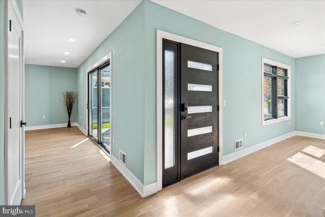 261 Moore St, Princeton, NJ 08540 - foyer with baseboards, light wood-style floors, and visible vents