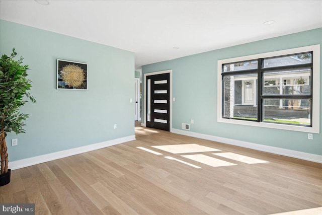 261 Moore St, Princeton, NJ 08540 - empty room featuring baseboards, visible vents, and light wood-type flooring