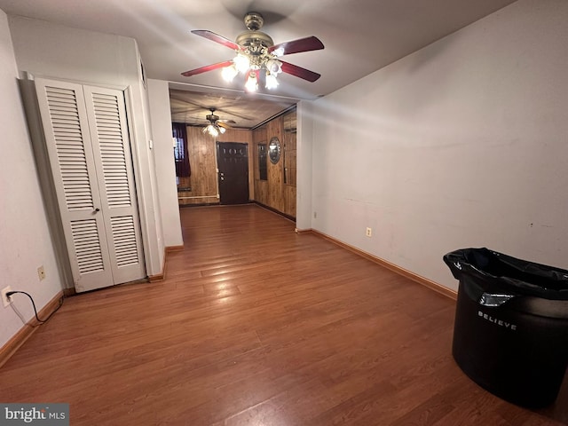 interior space with hardwood / wood-style flooring and ceiling fan