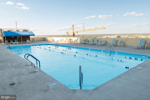 view of pool featuring a patio area