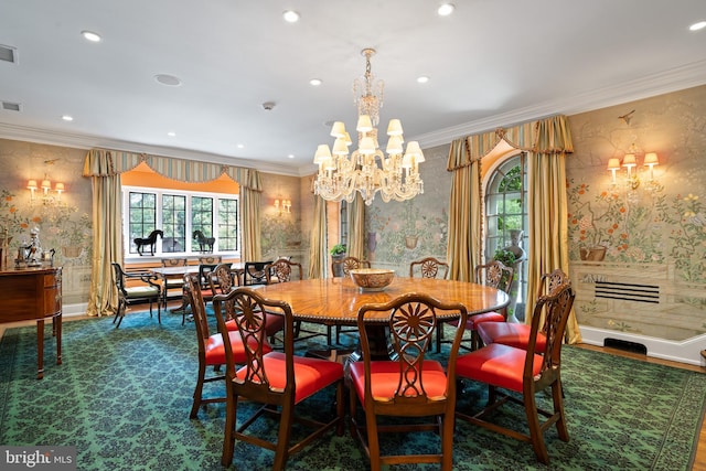 dining room with crown molding and an inviting chandelier