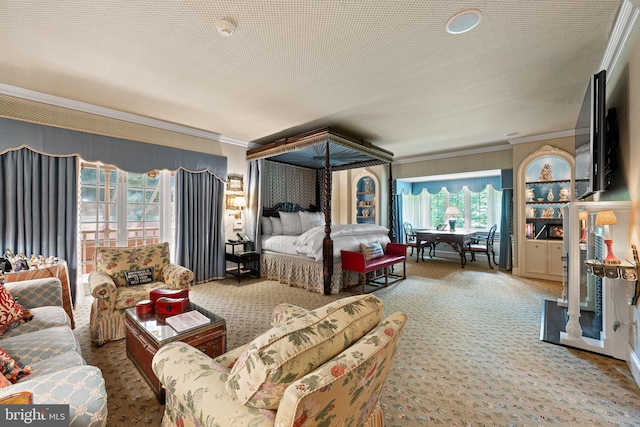 carpeted bedroom featuring crown molding and a textured ceiling