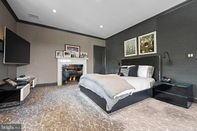 carpeted bedroom featuring ornamental molding