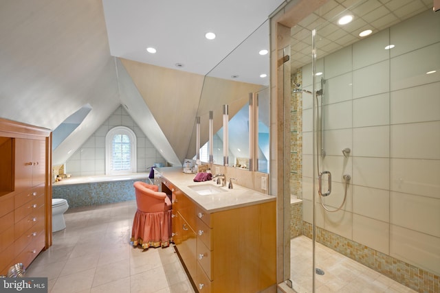 full bathroom featuring vanity, toilet, separate shower and tub, and tile patterned flooring