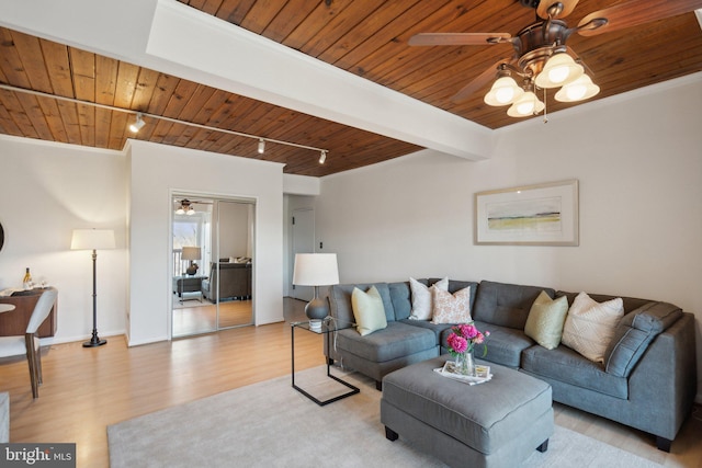 living room with wood ceiling, crown molding, light hardwood / wood-style flooring, track lighting, and ceiling fan