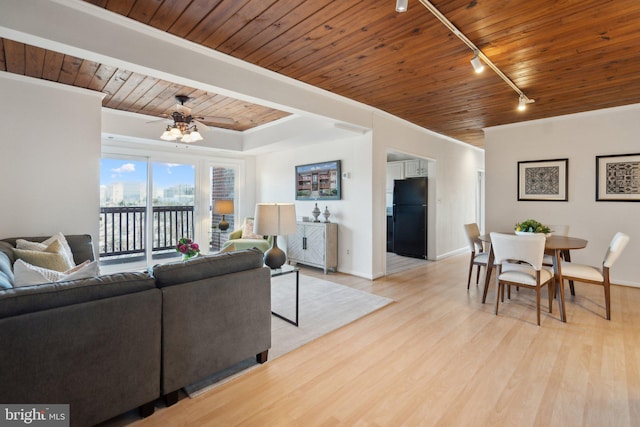 living room with ornamental molding, ceiling fan, track lighting, wooden ceiling, and light wood-type flooring